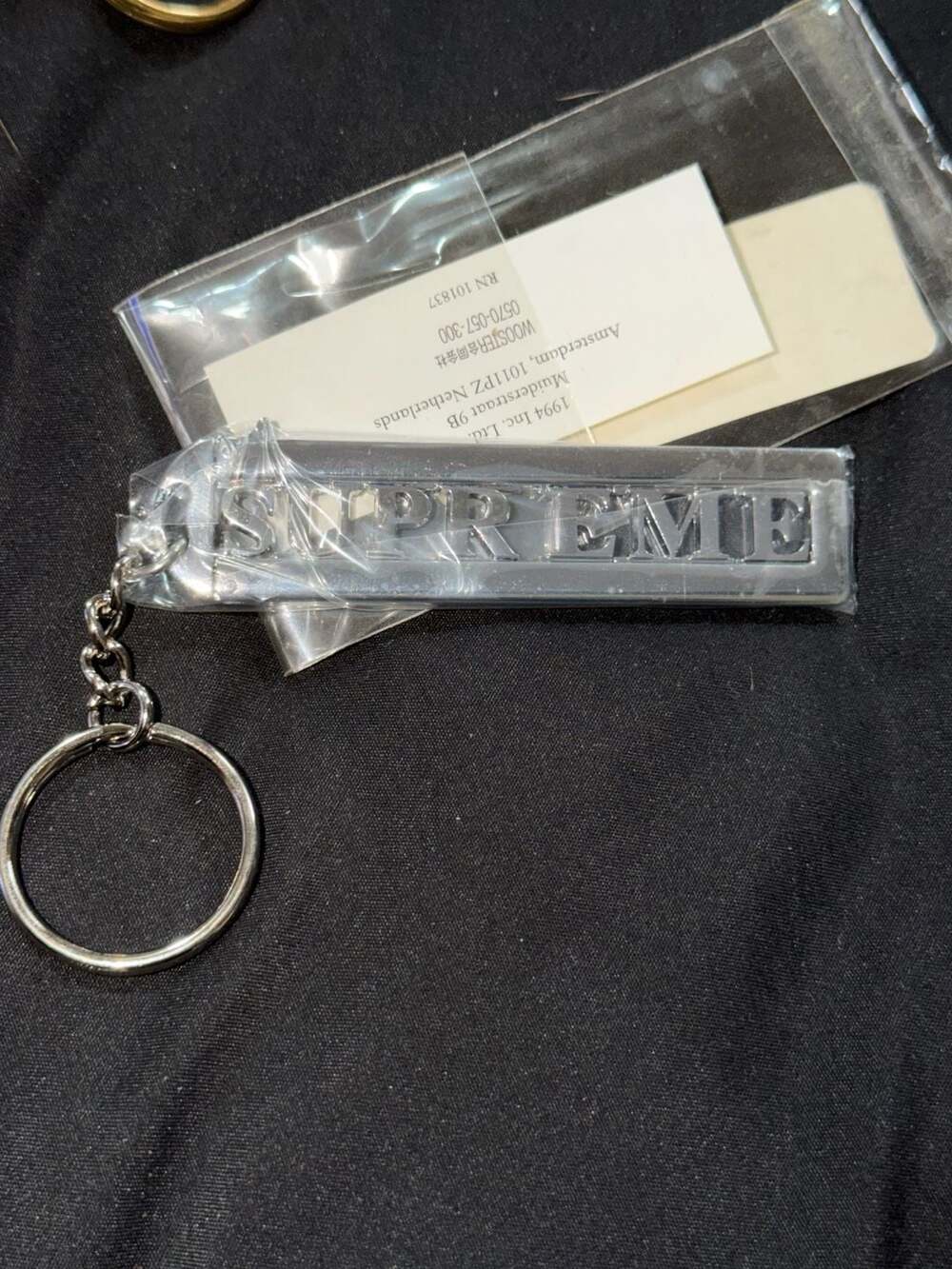 Supreme Slide Keychain Silver